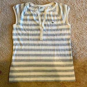 Lacoste women’s cap sleeve Henley. Gray and cream. 6 button.